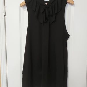 Black sleeveless top with rule and tie up at colla